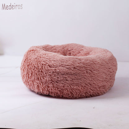 Soft plush pet nest bed by CareHaven with a cozy, cushioned interior for dogs and cats to rest comfortably.