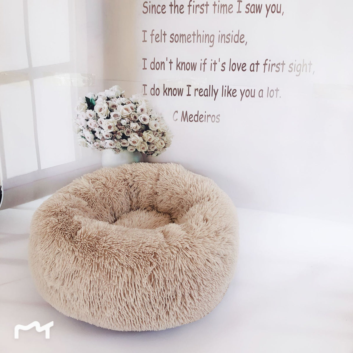 Soft plush pet nest bed by CareHaven for dogs and cats, featuring a cozy, cushioned interior and rounded edges.