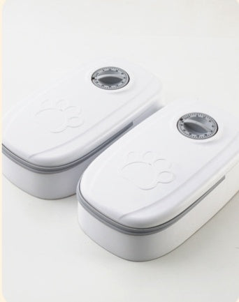 CareHaven automatic pet feeder and water dispenser for dogs and cats, with food and water bowls visible in the image.