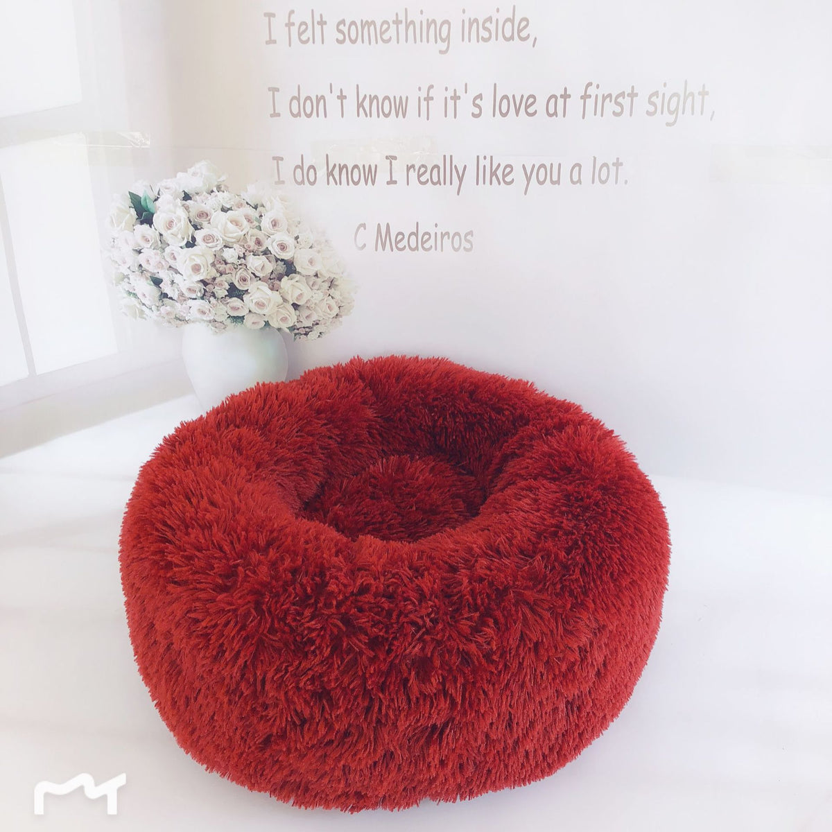Soft plush pet nest bed by CareHaven, cozy and cushioned for dogs and cats to rest comfortably.