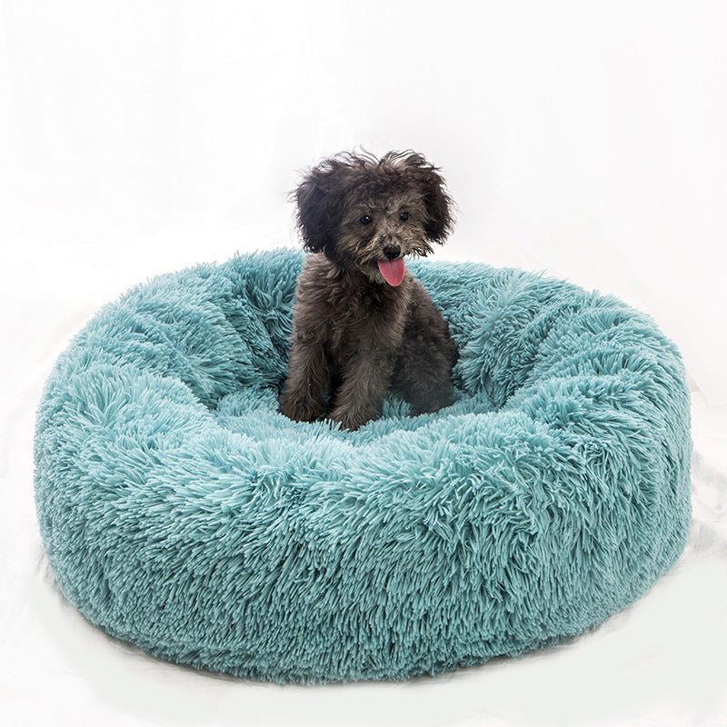 Soft plush pet nest bed by CareHaven with rounded edges and cozy interior, ideal for dogs and cats to rest comfortably.