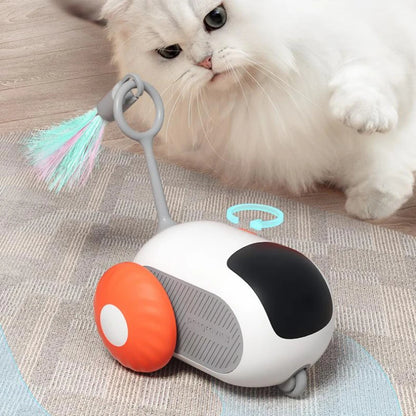 CareHaven remote-controlled cat car toy with colorful design, showing a playful feline chasing the interactive chase toy.
