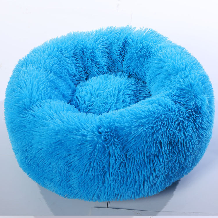 Soft plush pet nest bed by CareHaven with cozy, cushioned interior for dogs and cats, perfect for resting and lounging.