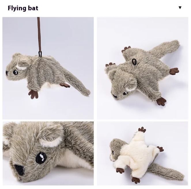 Colorful flapping bird cat toy with feathers and strings, designed to entertain cats and stimulate their hunting instincts.