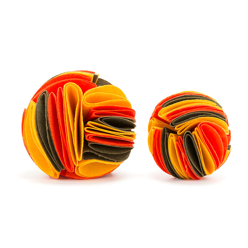 Interactive dog treat puzzle toy, Petcartsupply.store Snuffle Ball with textured surface for engaging play and mental stimulation.