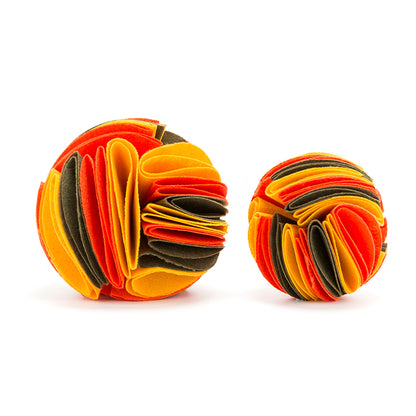Interactive dog treat puzzle toy, Petcartsupply.store Snuffle Ball with textured surface for engaging play and mental stimulation.