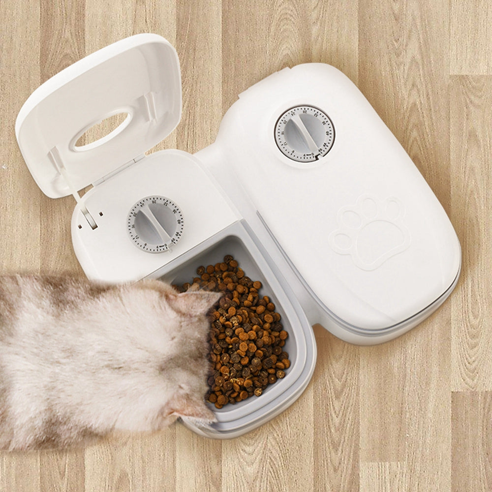 CareHaven automatic pet feeder and water dispenser for dogs and cats, with digital controls and food storage compartments.