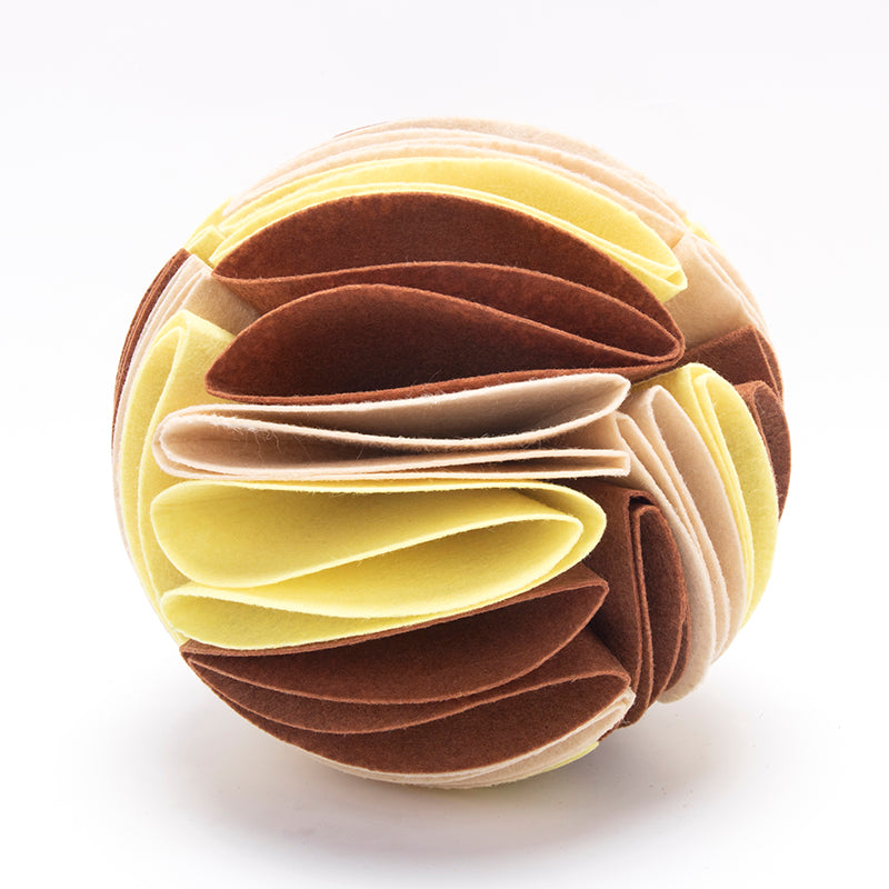 Interactive dog snuffle ball puzzle toy by Petcartsupply.store with treats hidden inside for mental stimulation and fun.