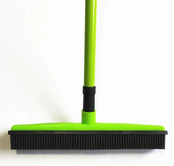 Pet Hair Removal Broom Mop from Petcartsupply.store, showing a close-up of the broom with pet hair cleaning bristles on a hardwood floor.