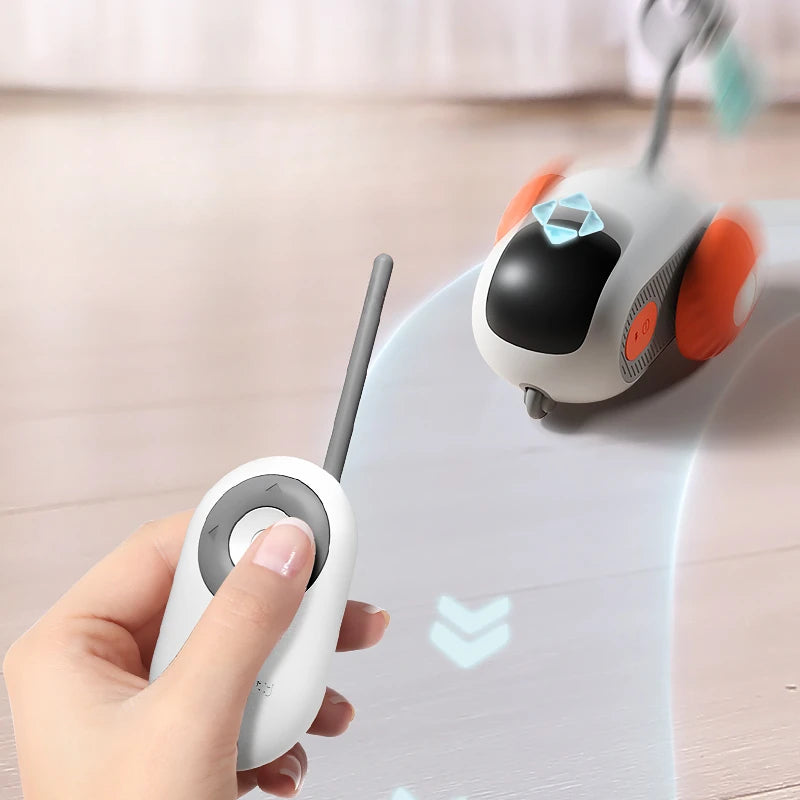 CareHaven remote-controlled cat car, an interactive chase toy for cats, showing a sleek black and red feline-shaped vehicle in motion.