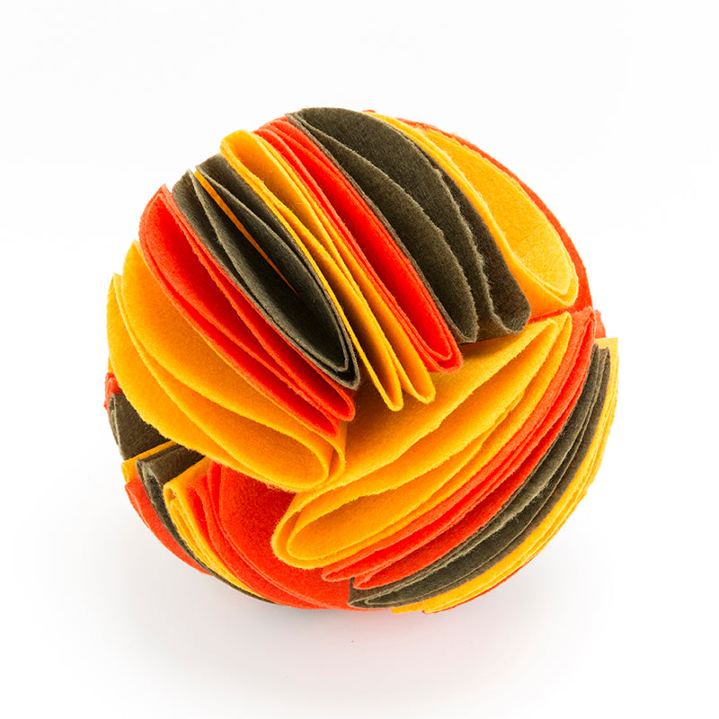 Interactive dog treat puzzle toy, Petcartsupply.store Snuffle Ball for dogs, featuring colorful fabric and hidden treat compartments.