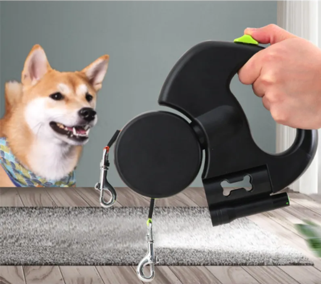 Auto double dog leash from Petcartsupply.store showing a sturdy black leash with two clips for walking two dogs simultaneously.
